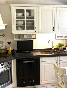 IMMOBERLIN.DE - Fabelhaftes Haus mit Südterrasse, Gewerbeanteil & Garage in familienfreundlicher Lage - Panketal