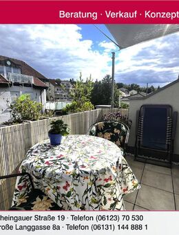 Pfiffige Dachgeschoss-Wohnung mit sonniger Dachterrasse und Garage in ruhiger 1-A-Lage - Budenheim