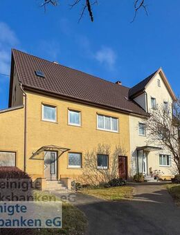 Zweifamilienhaus, Doppelgarage und ein großes Bauland. - Wannweil