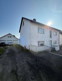 Gepflegtes 2 Familienhaus teilvermietet mit großem Grundstück in Calden/ Obermeiser - Calden