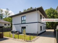 IMMOBERLIN.DE - Energieeffizientes Einfamilienhaus mit Südterrasse & Garage in naturschöner Lage in Seenähe - Wandlitz
