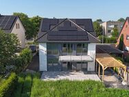 Erstbezug Stilvolle Erdgeschosswohnung mit Südterrasse, Garten & hochwertiger Ausstattung - Ennigerloh