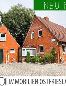 Zentral und doch ruhig und idyllisch! EFH mit Garage und sichtgeschütztem Garten in zweiter Reihe - Krummhörn