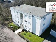 SCHADE IMMOBILIEN - Vermietete 3-Zimmer-Eigentumswohnung mit Balkon und Garage! - Lüdenscheid