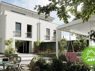 Erlensee: Moderne Neubau-Maisonettewohnung mit großzügigem Wohnbereich und Dachterrasse - Erlensee