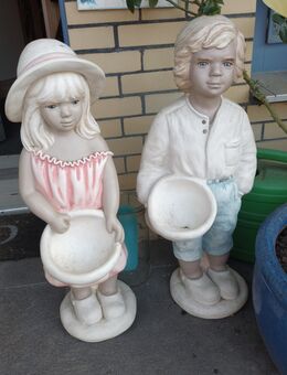 2 massive Figuren - Peine