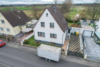 DIETZ: Modernisierungsbedürftiges Einfamilienhaus mit Garten in direkter Feldrandlage von Rollwald!