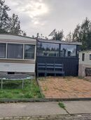Te koop ruime stacaravan met overkapping in 47559