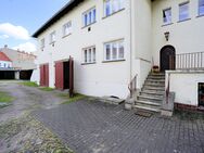 Ein Einfamilienhaus mit Gewerberäumen und Nebengelass. - Brandenburg (Havel)