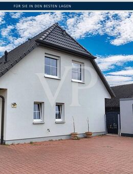 Familientraum in Issum-Sevelen: Modernes Wohnglück mit Sonnenterrasse und Garage - Issum