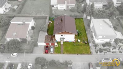 Gepflegtes Wohnung im 1. OG mit Grundstück, Garage, vermietet, zu verkaufen.