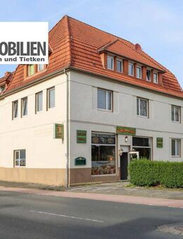 TT bietet an: Vier Wohnungen und ein Ladengeschäft in einem Mehrfamilienhaus in Neuengroden! - Wilhelmshaven