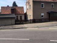 Herrlich gelegenes Baugrundstück mit Garage und Gartenhaus - Riesa