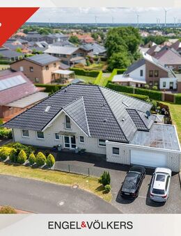 Familientraum auf zwei Ebenen - Großzügiger Bungalow mit Dachausbau und Garten - Esterwegen