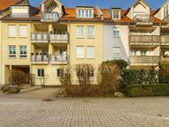 Attraktive Terrassenwohnung mit 3 Zimmern, Gartenanteil, TG-Stellplatz und EBK in ruhiger Lage - Roth (Bayern)