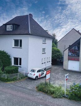 Zwei in Einem: Einfamilienhaus mit vielseitig nutzbarem Gewerbeobjekt***4135 G in GT-Isselhorst - Gütersloh