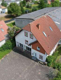 Einfamilienhaus mit Gewerbehalle und Garten auf 2.600 m² Grundstück in Borgentreich-Borgholz - Borgentreich (Orgelstadt)