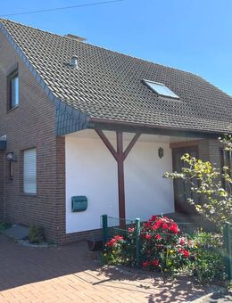 PURNHAGEN-IMMOBILIEN - Farge - gepfl. freist. 1-Fam.-Haus mit Vollkeller u. Garage in ruhiger Lage - Bremen