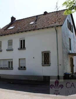 Zentrale Lage, großes Potenzial: Mehrfamilienhaus mit 3 Wohnungen in Homburg! - Homburg