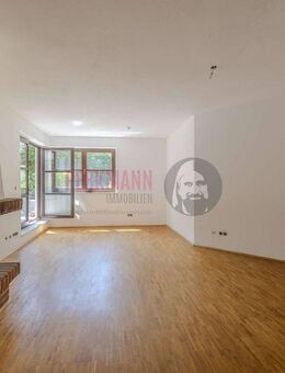 3 Zimmer Split-Level Gartenwohnung mit Sauna und Tiefgaragenstellplatz in ruhiger Lage - München