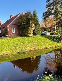 SANIERUNGSBEDÜRFTIGES HANDWERKERHAUS IN SCHÖNER KANALLAGE VON GROßEFEHN - Großefehn