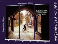 Bestatterbedarf: Roll-Up Display "Radfahrer vor Torbogen" - Trauerfeier-Deko - Wilhelmshaven Zentrum