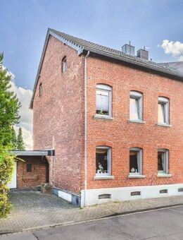Teilweise vermietetes Wohnhaus mit traumhaftem Garten und großer Garage in Broichweiden - Würselen