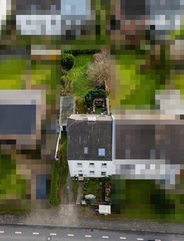 Leverkusen-Schlebusch: Gemütliche Doppelhaushälfte mit zwei Einheiten und viel Potenzial - Leverkusen