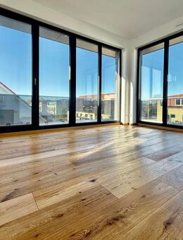 Erstbezug: Exklusives Penthouse mit umlaufender Dachterrasse 'Wohntraum Grüner Bogen' - Leipzig