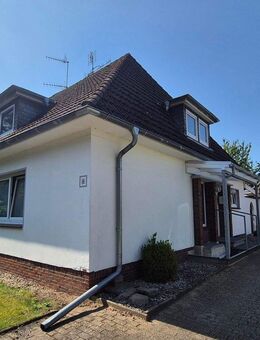 Zweifamilienhaus mit großem Grundstück und solider Rendite in Huntlosen - Ohne Käuferprovision! - Großenkneten