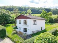 Idyllisches Wohnen im Grünen: Gemütliches Einfamilienhaus mit zusätzlicher Wohnfläche zwischen Moringen und Einbeck - Einbeck