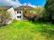 **Stilvolles und freistehendes Zweifamilienhaus mit großzügiger Wohnfläche und Garten** - Neunkirchen (Saarland)
