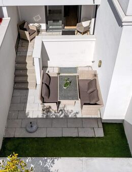 Exklusive 3-Zimmer-Wohnung mit Atriumgarten - top Lage! - München