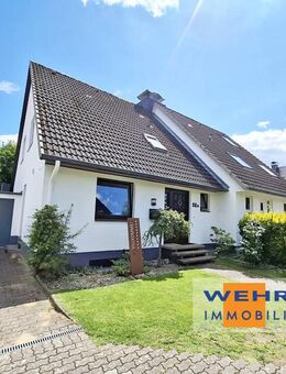 Familiengerechte Doppelhaushälfte mit Vollkeller und Garage auf idyllischem Grundstück - Bargteheide