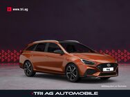 Hyundai i30, 1.5 T-GDI N Line Hybrid Jupiter Orange Metallic, Jahr 2022 - Kippenheim