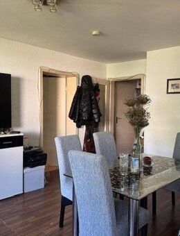 Brück Immobilien - Ruhige, vermietete 2 Zi.-ETW mit gemütlicher Ost-Loggia und Weitblick - München