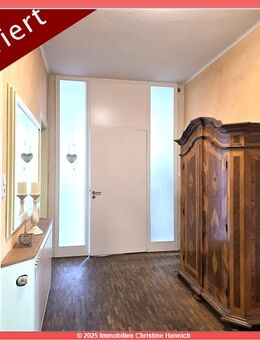 RESERVIERT! Attraktive Erdgeschosswohnung im Herzen von Westerkappeln mit Terrasse und Gartenanteil - Westerkappeln