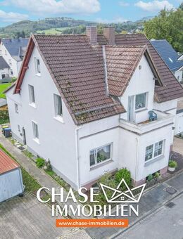 Charmante Doppelhaushälfte mit eigenem Garten und Garagen - Wohnen in TOP-Lage Lügdes! - Lügde (Stadt der Osterräder)