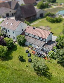 Attraktive Kapitalanlage: Zwei vermietete Häuser in ruhiger Ortsrandlage - Emskirchen