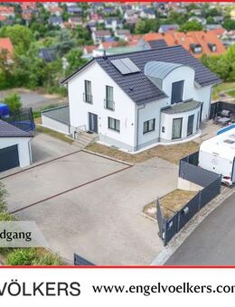 Attraktives Wohnhaus mit vielseitig nutzbarer Praxis/Gewerbeeinheit in Eisingen - Eisingen (Bayern)