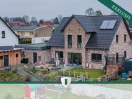 Exklusives, energieeffizientes Einfamilienhaus mit Doppelgarage und unverbaubarem Blick - Dassow