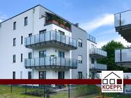 Kapitalanlage! Vermietete Erdgeschosswohnung mit Terrasse, Garten + Garage, moderne Wohnanlage - Königs Wusterhausen