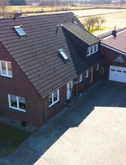 Einfamilienhaus mit Einliegerwohnung - 1 Hektar Land und Stahlhalle - Wiesmoor