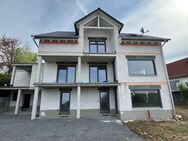 Erstbezug: 3 moderne 3-Zimmer-Wohnungen mit jeweils großzügiger Terrasse oder Balkon - Poppenhausen