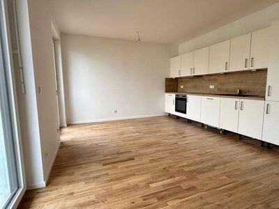 Hochwertiger Erstbezug: 4-Raum-Wohnung mit Gäste-WC, Balkon und moderner Einbauküche