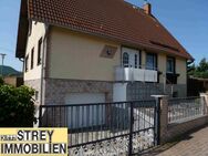 Freistehendes Wohnhaus mit Garagen, Nebengelass und gepflegten Grundstück in gefragter Lage - Harztor