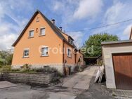Familienfreundliches Einfamilienhaus mit Einliegerwohnung und Garten in Rauhenebrach - Rauhenebrach