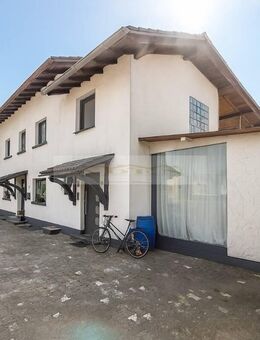 Mehrgenerationen- oder Kapitalanlage - Wohn- & Gewerbeimmobilie mit 20 Stellplätzen und Photovoltaik - Bad Nauheim