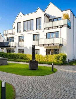 Möblierte 2-Zimmerwohnung im Neubau im ersten Obergeschoss mit Aufzug und Tiefgarage. - Linz (Rhein)