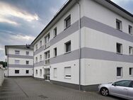 Moderne 4 -Zimmer-Wohnung in Flechtorf mit Kamin, Dachterrasse, ausgebautem Dachgeschoss und Garage - Lehre